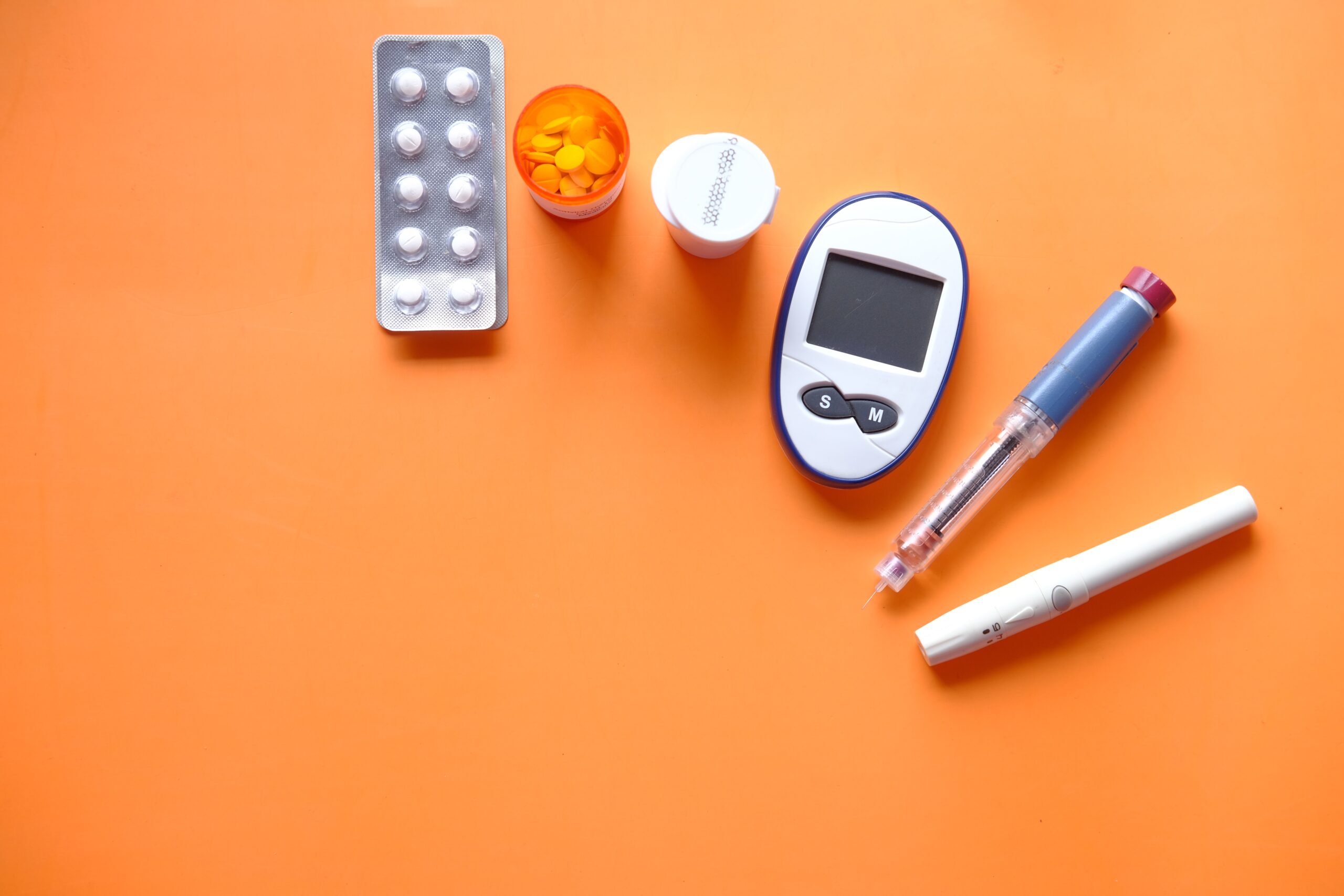 multiple tools related to diabetes patient such as glucose level test and pills
